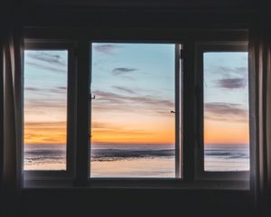 are wood or aluminium impact windows better